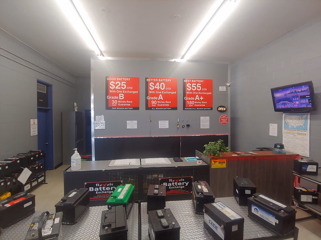 Battery grade and pricing signage inside a ReVolt Battery Exchange store